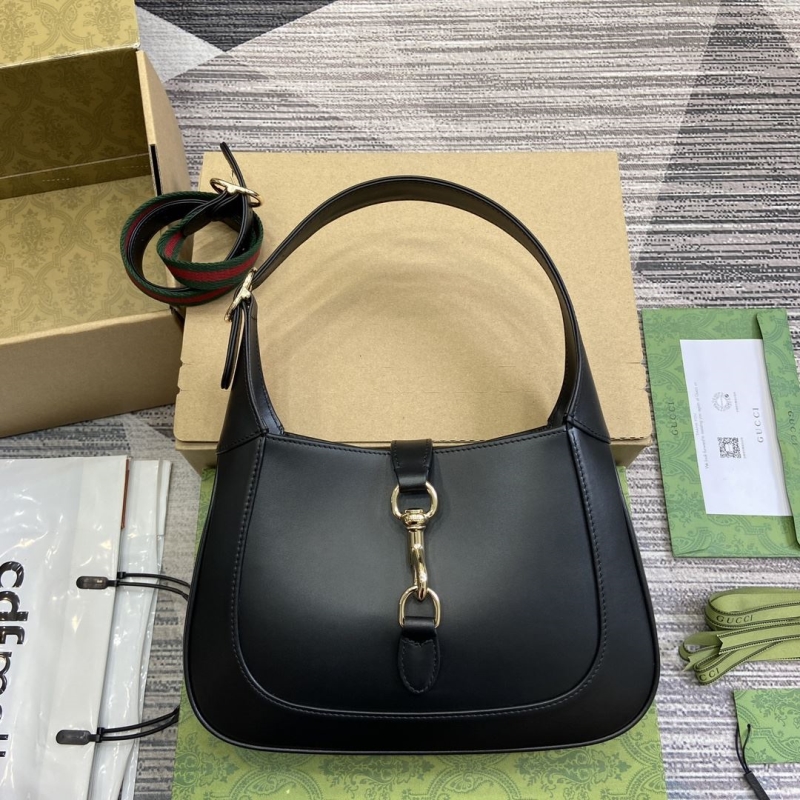G*u*i top handle bags